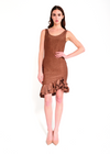 Woman wearing a brown dress with ruffled hem on a white background